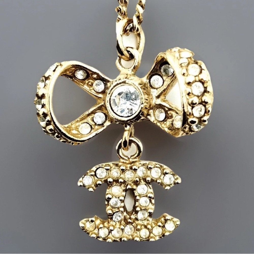 Auth🔥CHANEL Crystal Bow Necklace🌸W/ free COA /Chanel Box-EUC - Picture 5 of 15